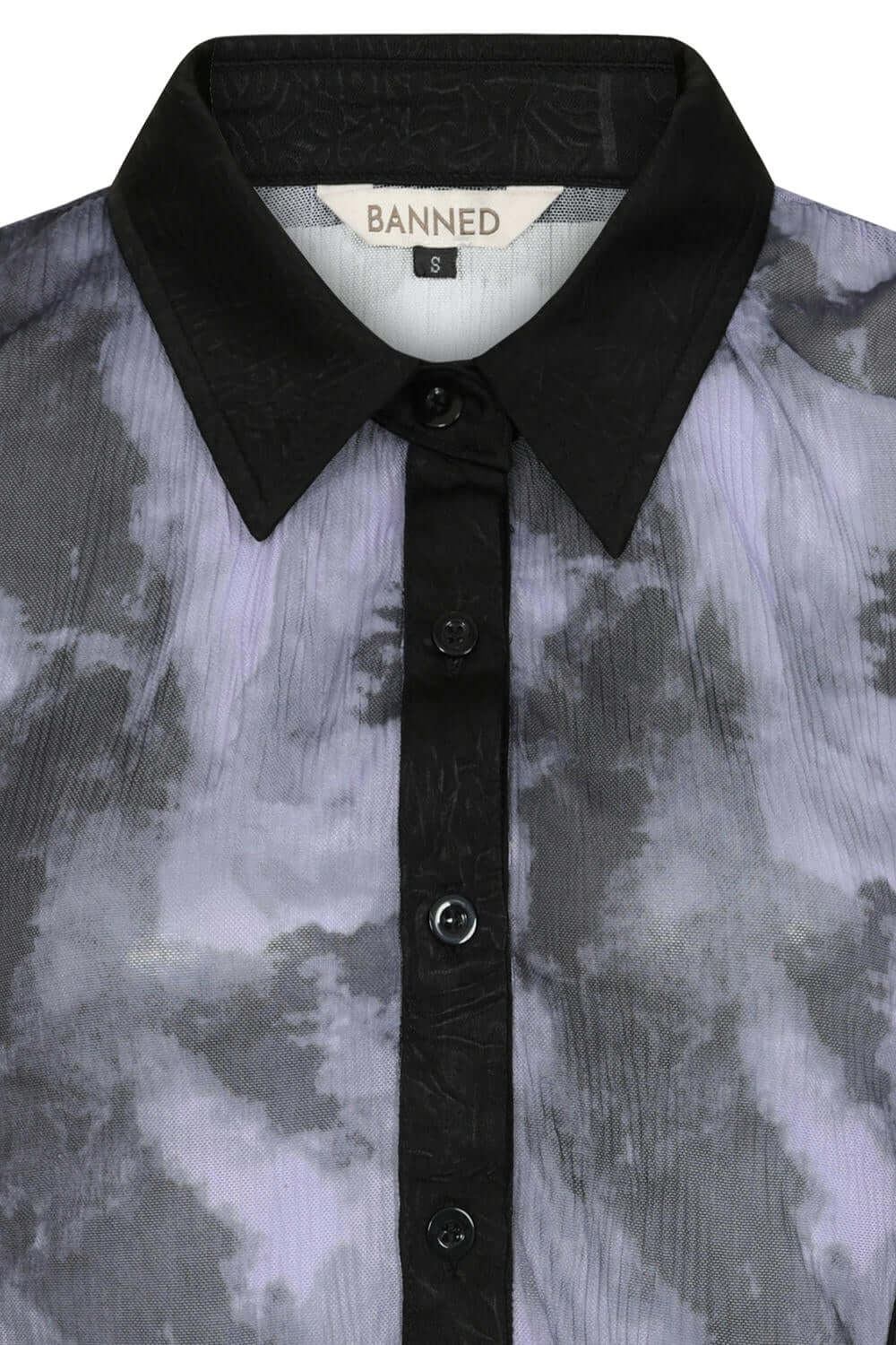 Close-up view of the Banned Apparel Selene Mesh Blouse, highlighting the luxurious texture and intricate details of 100% polyester woven fabric