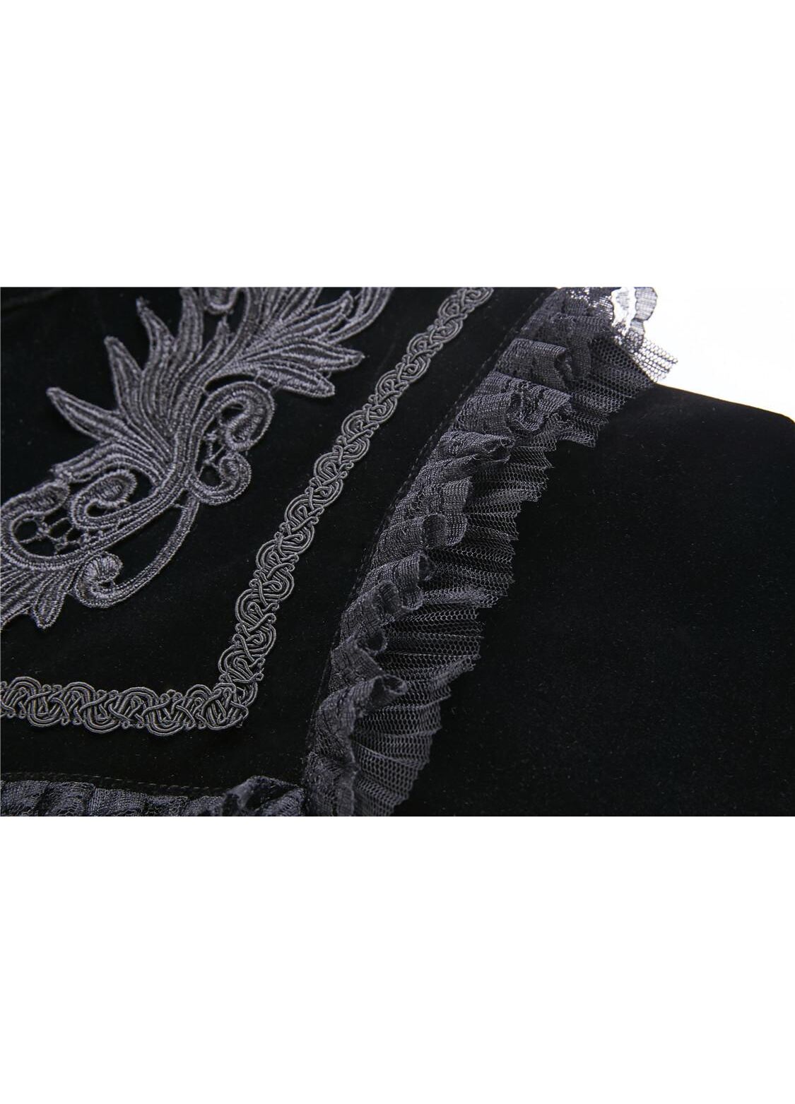 Black velvet Lark capelet by Dark In Love draped elegantly, perfect for adding a sophisticated touch to evening attire with its refined design.
