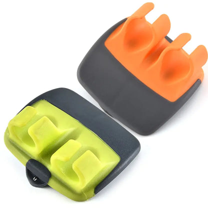 Dual-coloured ergonomic peelers in orange and green, reflecting luxury and style, perfect for effortless food prep while enhancing kitchen aesthetics.
