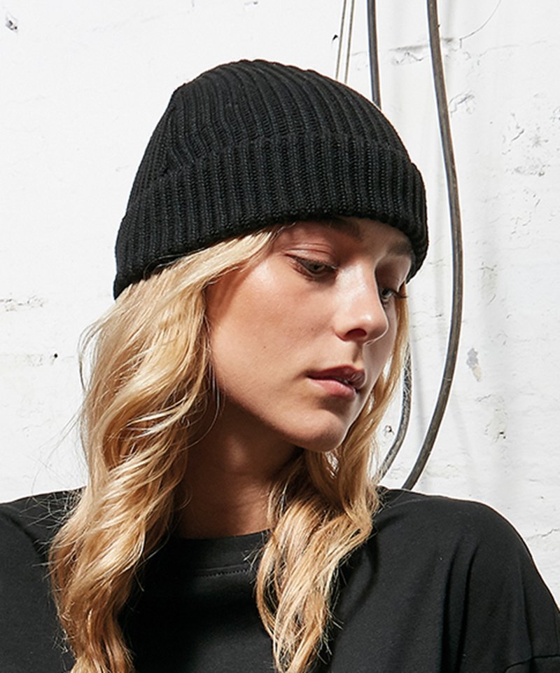 Luxurious eco-friendly recycled polyester fisherman beanie with a folded brim in elegant styling, perfect for sustainable fashion.