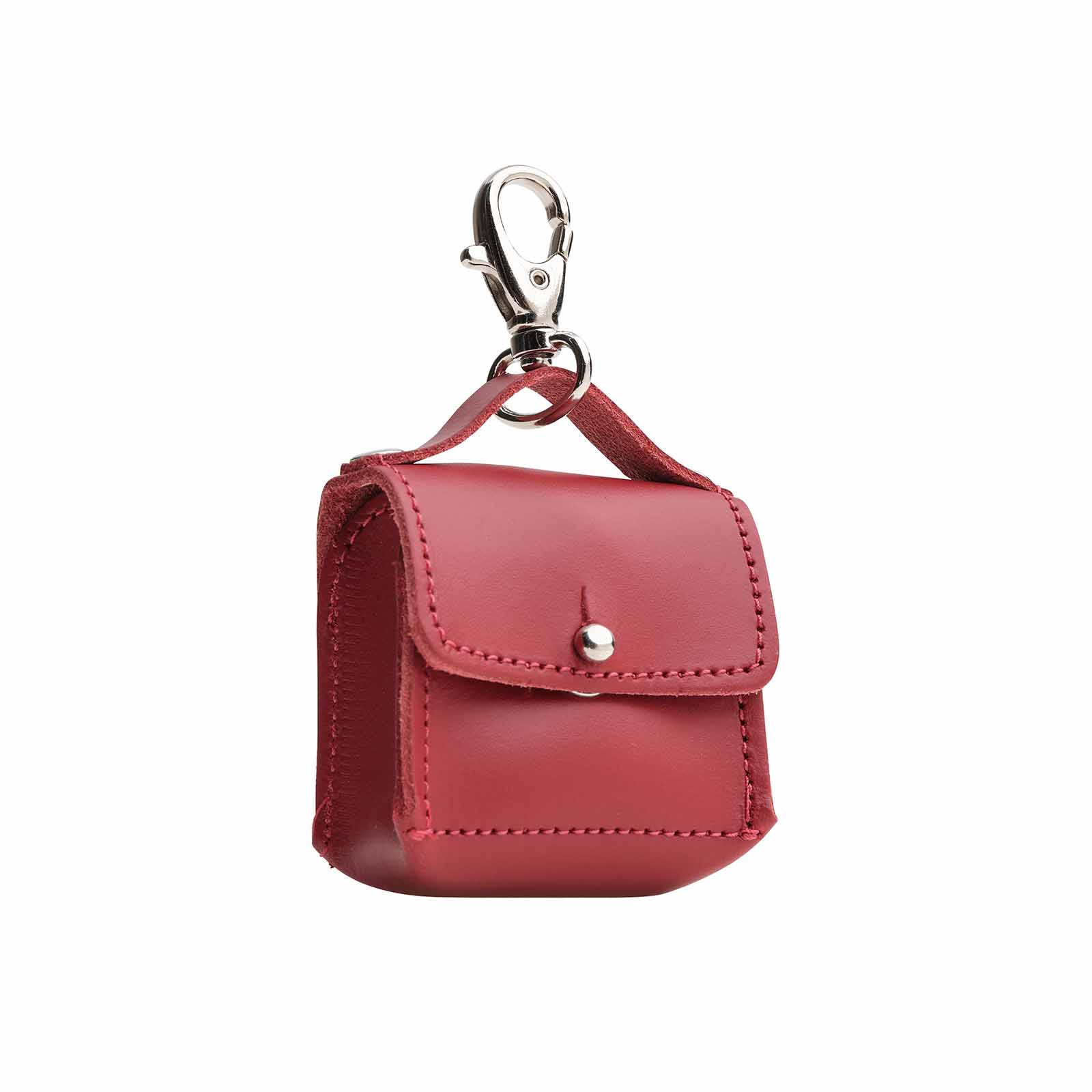 Luxury Mini Bag Charm in hand-crafted red leather, elegantly designed keyring accessory, made in England by Zatchels, showcasing premium craftsmanship and style.