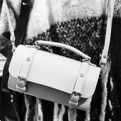 Close-up of the Ghost Grey Zatchels Bowler Bag highlighting premium leather texture and bespoke customisation options available for a unique gift.