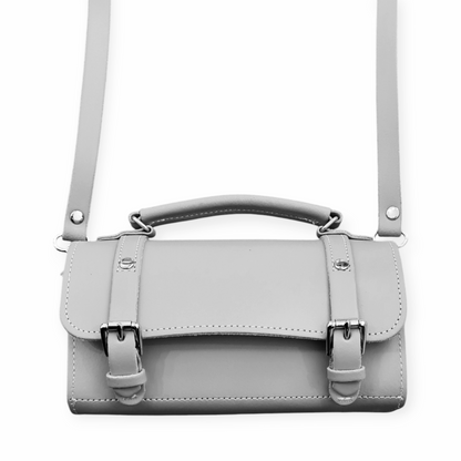 Versatile Zatchels Bowler Bag displayed with a detachable crossbody strap for hands-free convenience, ideal for on-the-go fashion.