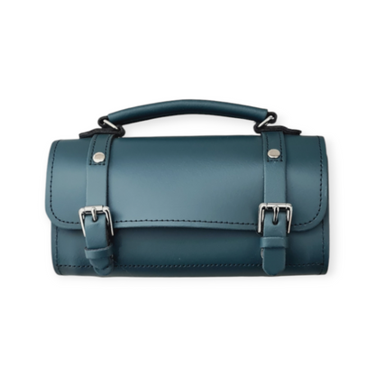 Luxurious handmade leather bowler bag in pine green, 18cm size, showcasing its stylish cylinder shape and elegant design.