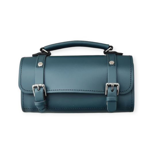 Luxurious handmade leather bowler bag in pine green, 18cm size, showcasing its stylish cylinder shape and elegant design.