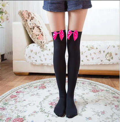 Stylish Women's Sexy Thigh High Lace Stockings in black with vibrant pink bows, perfect for bedroom wear, combining elegance and playful charm.