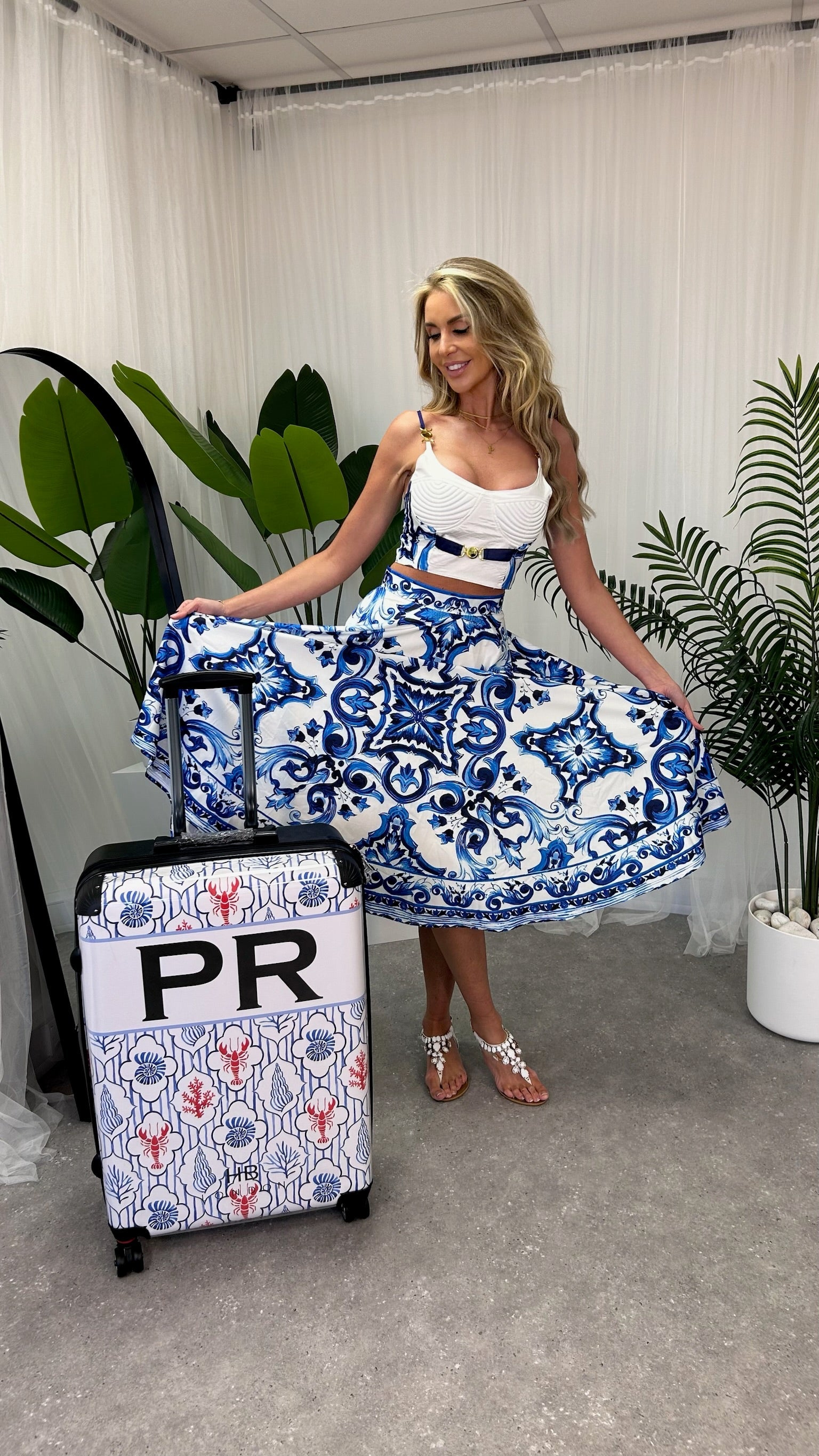 The Penelope Maxi Skirt elegantly flowing in the breeze, highlighting the chic design and luxe fabric of the set.