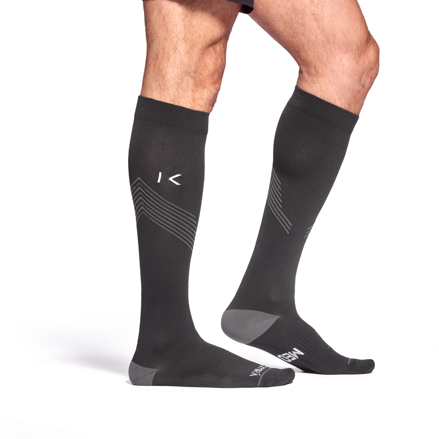 KYMIRA Infrared Compression Socks 3.0 elegantly designed for optimal performance, featuring graduated compression fit and luxurious fabric support, available in sizes S, M, and L.