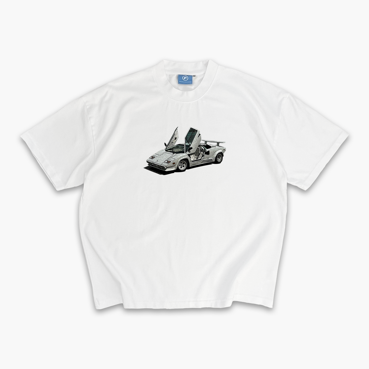 FROST oversized Chalk White Countach Tee featuring a luxurious Lamborghini graphic, embodying premium streetwear style.