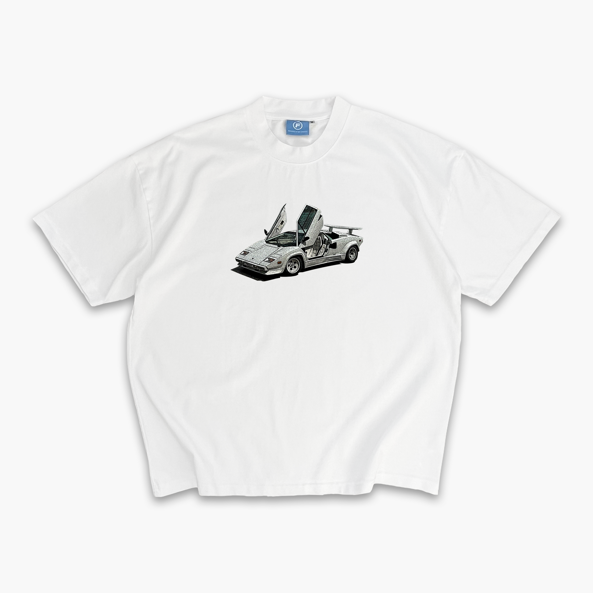 FROST oversized Chalk White Countach Tee featuring a luxurious Lamborghini graphic, embodying premium streetwear style.