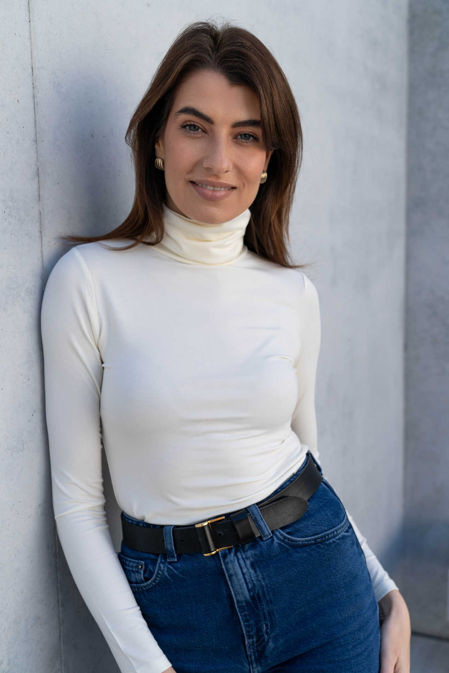 Stylish Women's Roll Neck TENCEL™ Modal Top, showcasing a tailored fit and irritation-free details for ultimate comfort.