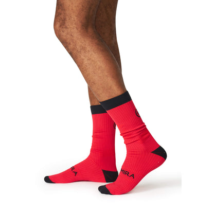Luxury KYMIRA Infrared Crew Socks designed for enhanced performance and recovery, featuring cushioned heel and toes, and arch support.