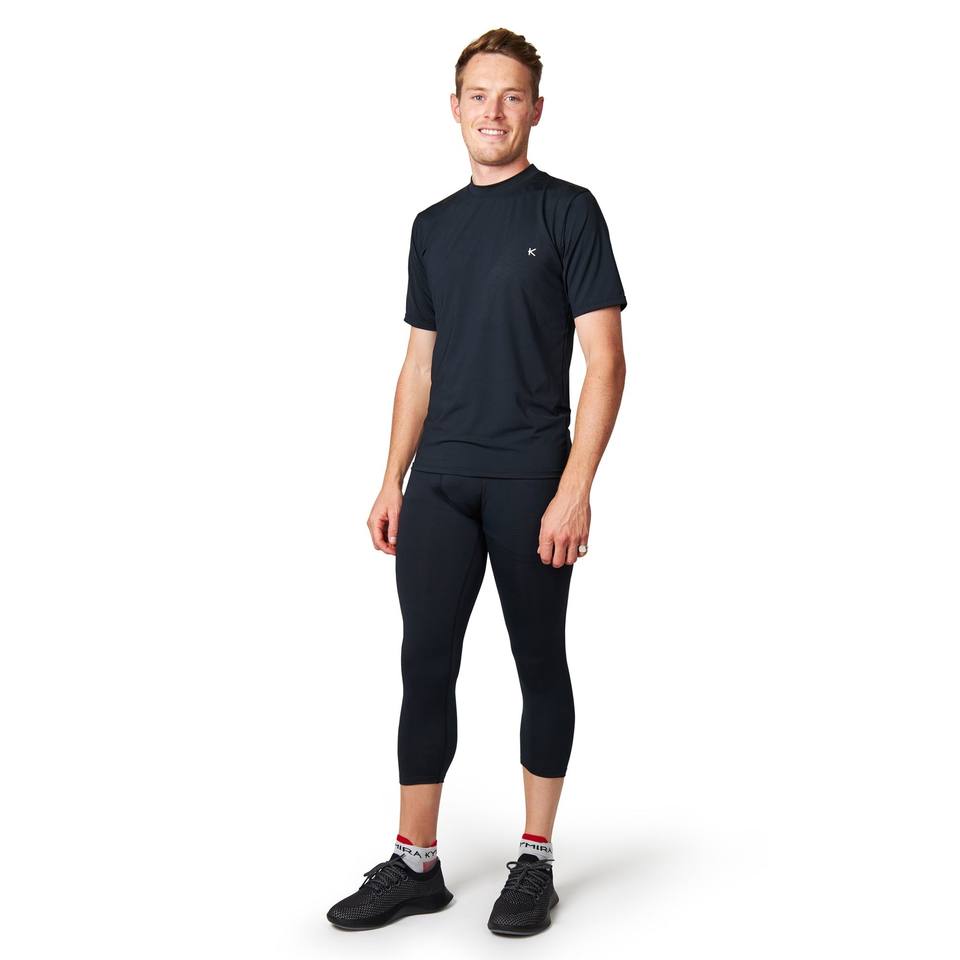 Close-up of the KYMIRA Men's Infrared Performance Crew T-Shirt showcasing its premium fabric and intricate flat-lock stitching to prevent friction.