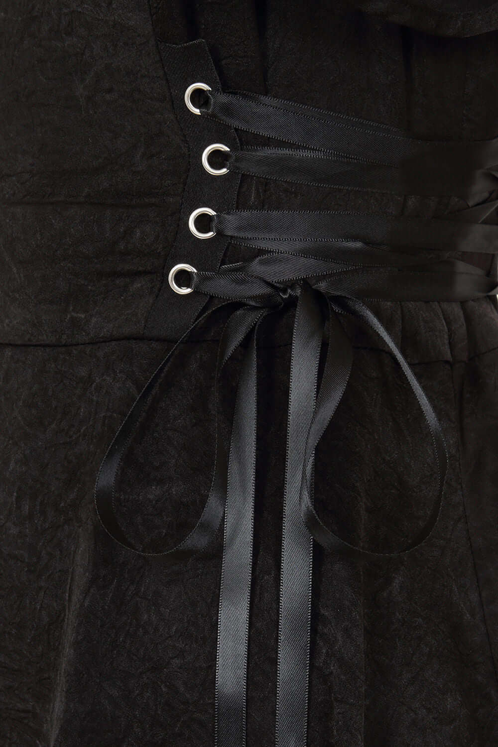 Model wearing the Banned Apparel Zora Gothic Lace Dress with corset detail, highlighting the dramatic asymmetrical silhouette and luxurious gothic charm.