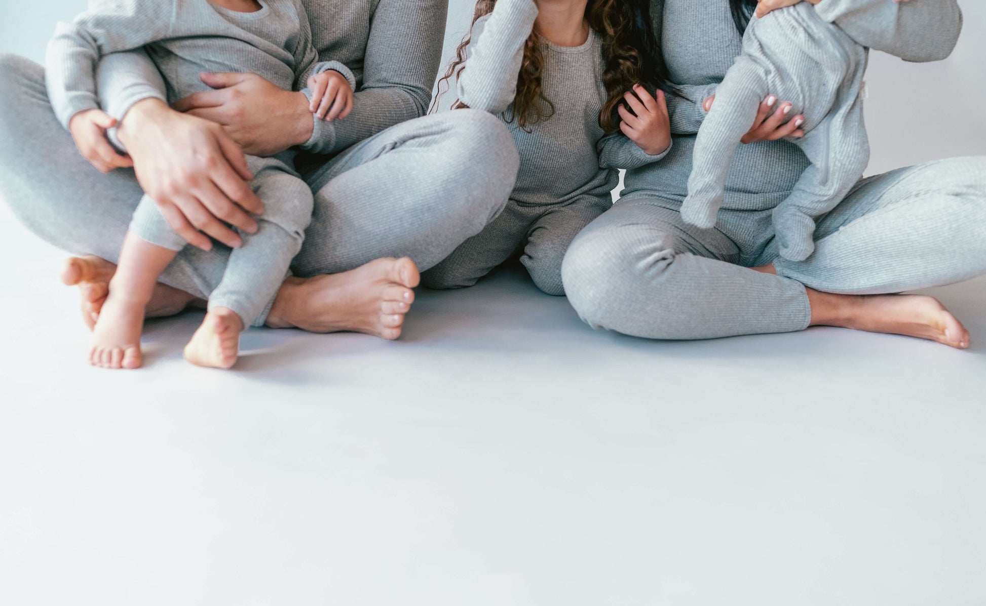 Gift idea: DreamBuy Dove Grey Family Matching Pyjamas Set suitable for any family member, showcasing its unisex design and luxurious cotton blend.