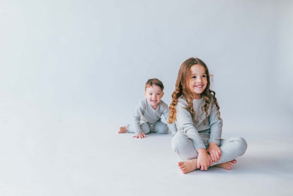 Luxurious Dove Grey Family Matching Pyjamas by DreamBuy, crafted from a soft cotton blend, designed for chic comfort and available in sizes from 3 months to XXL.