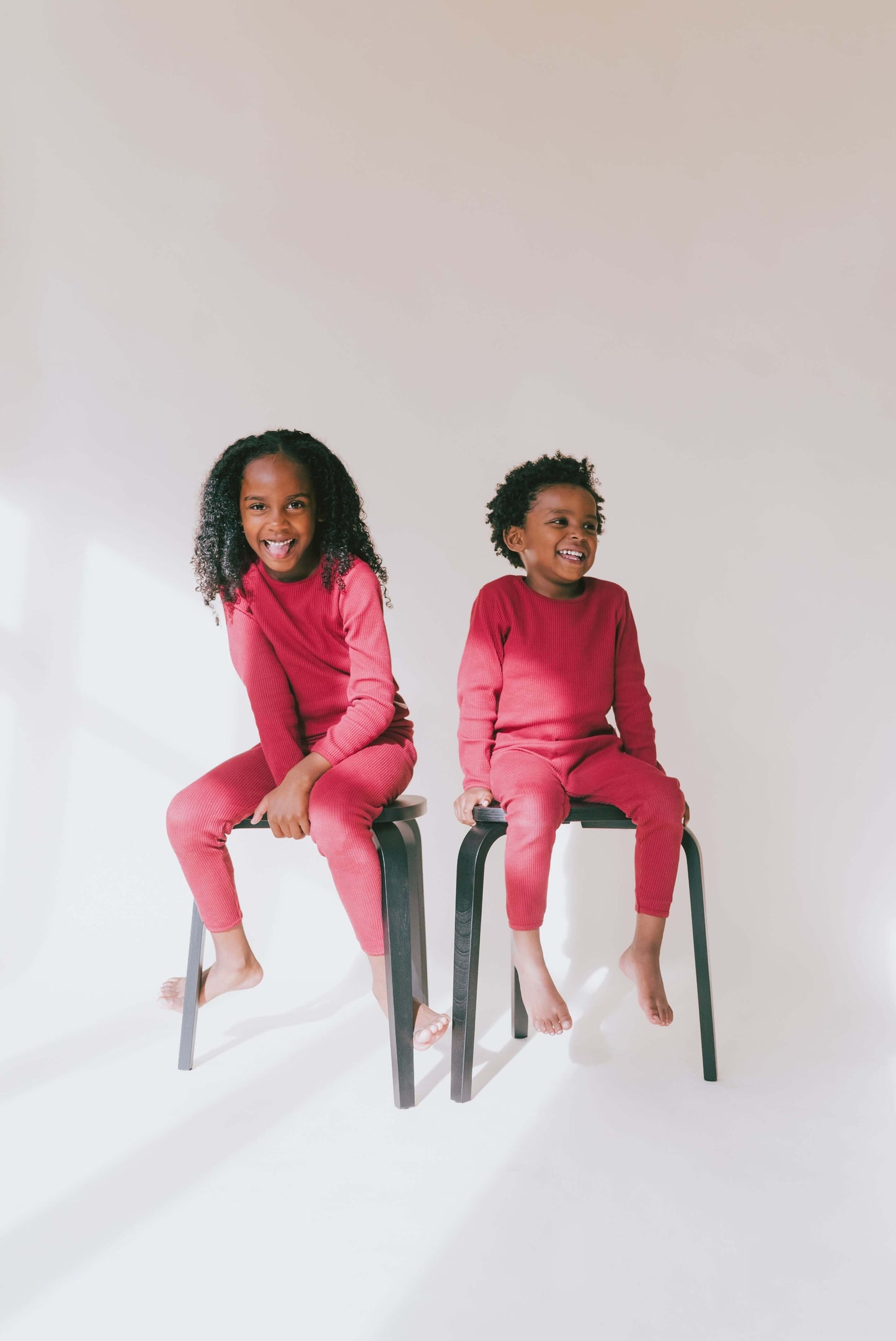 Detail shot of DreamBuy's luxury claret red family pyjamas, showcasing the breathable, lightweight ribbed fabric for ultimate comfort.