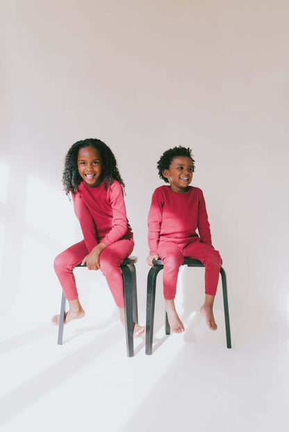 Detail shot of DreamBuy's luxury claret red family pyjamas, showcasing the breathable, lightweight ribbed fabric for ultimate comfort.