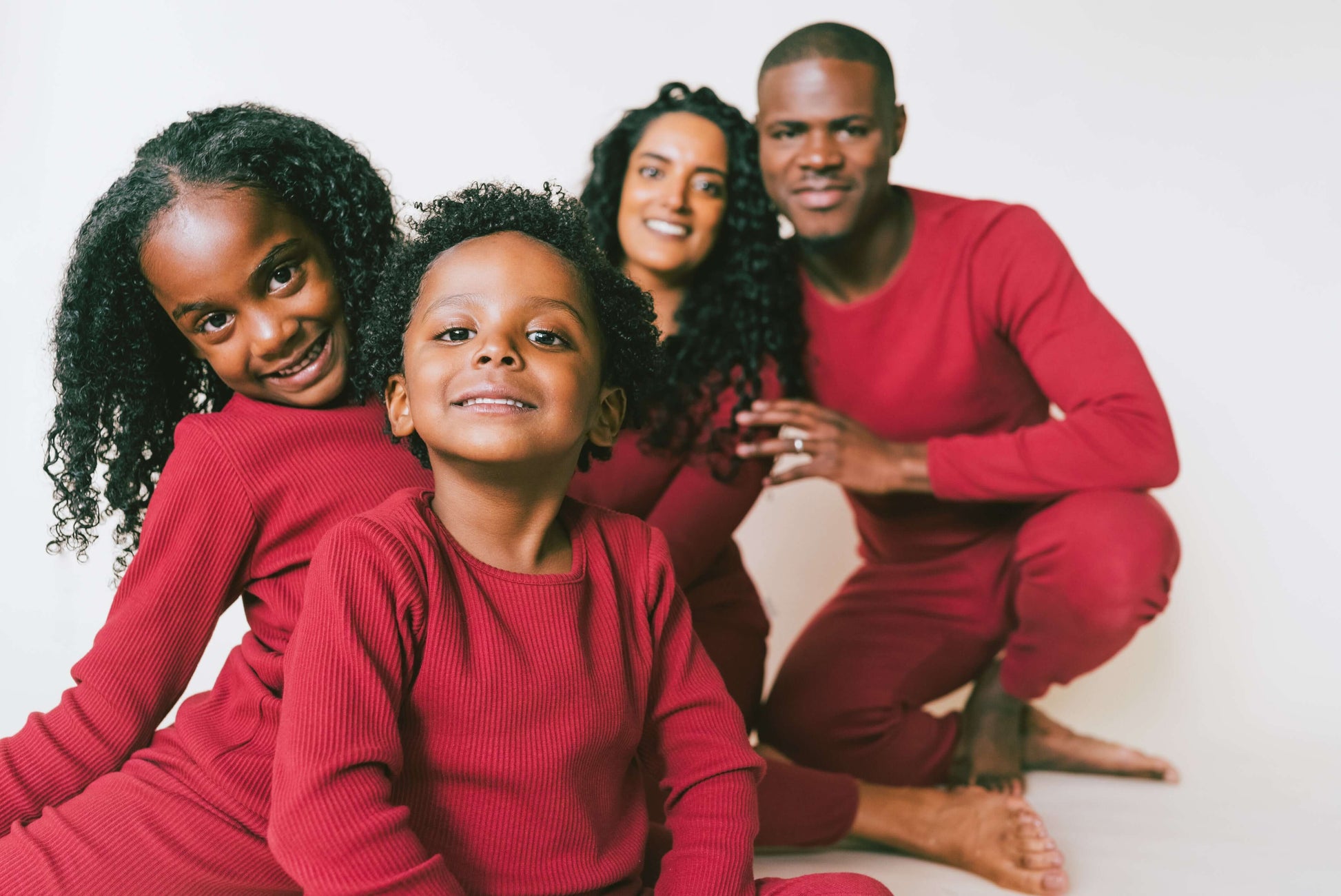 Luxury family matching Christmas pyjamas in Claret Red by DreamBuy, featuring soft ribbed fabric, suitable for sizes from 3 months to XXL, perfect for festive family gatherings.