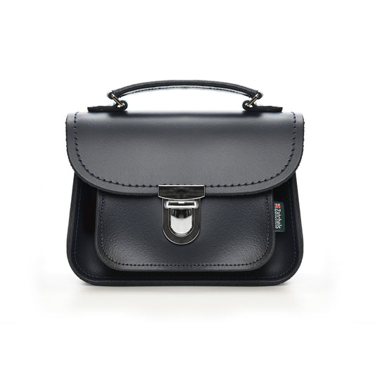 Luxury handmade navy leather Luna bag by Zatchels, featuring a chic design, push-lock clasp, and adjustable strap, perfect for stylish day-to-night transitions.