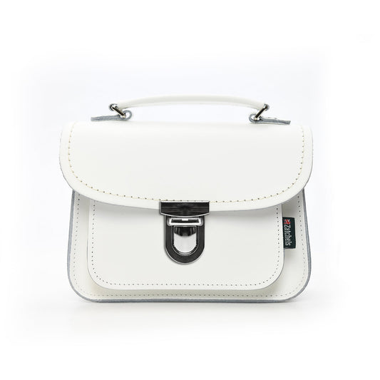Elegant Luna Handmade White Leather Bag showcased in a stylish crossbody position, crafted from premium UK leather for the modern fashionista.