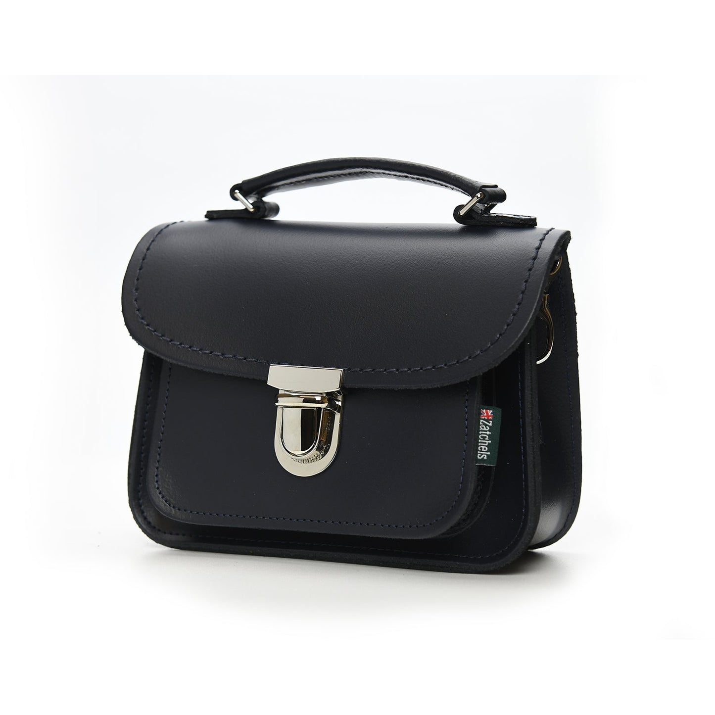 Close-up detail of the luxurious navy leather texture of the Zatchels Luna bag, highlighting its craftsmanship and elegant finish.