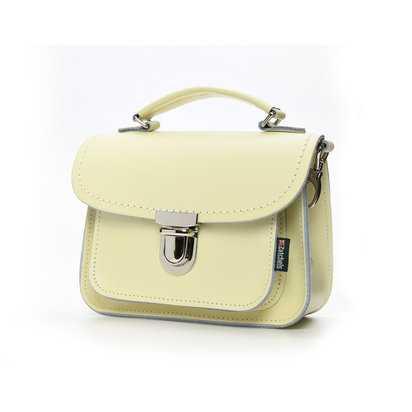 Close-up of the Luna Cream Handmade Leather Bag, highlighting the premium UK-produced leather and secure push lock clasp.