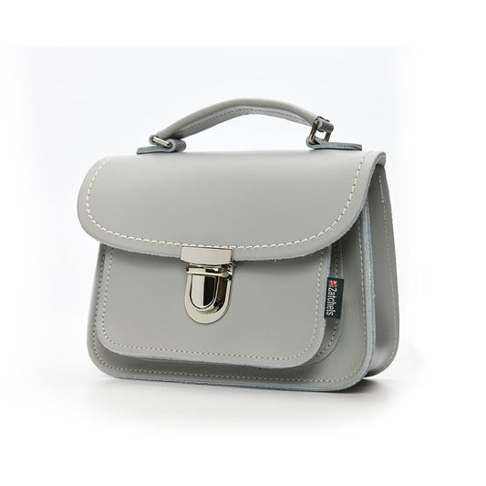 Luna Handmade Ghost Leather Bag in pastel cream, featuring a stylish design and adjustable crossbody strap, perfect for luxury fashion lovers.