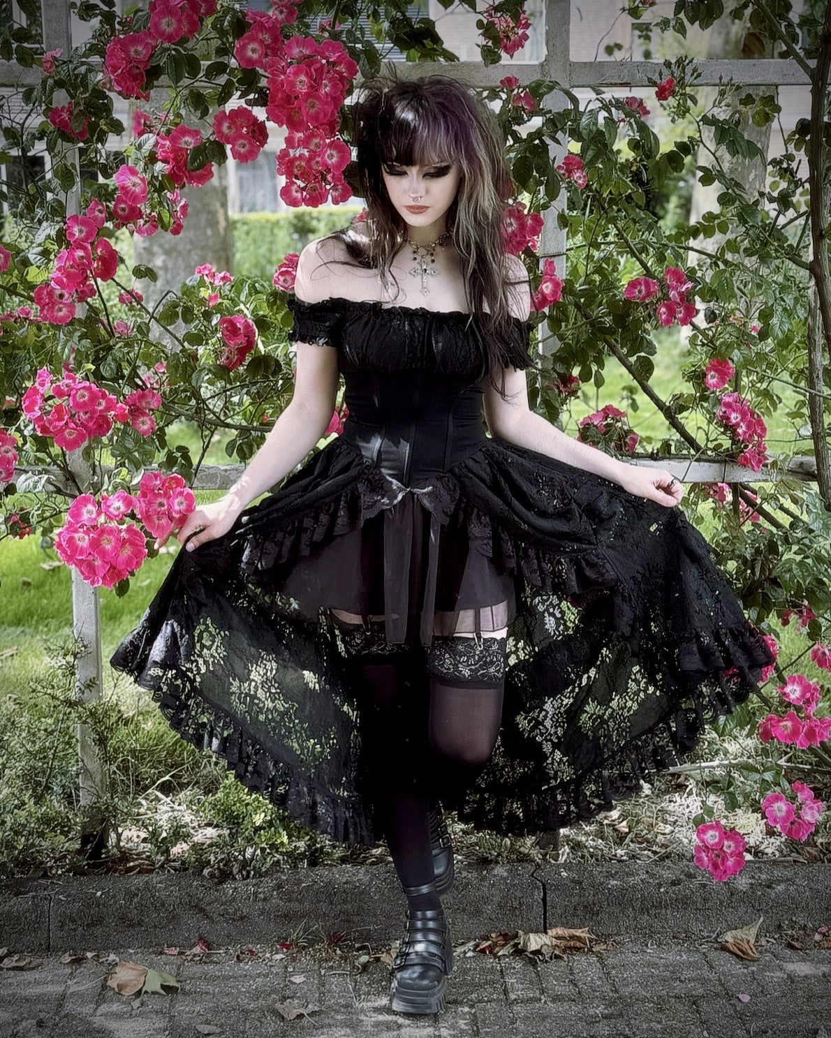 Side view of the Dark In Love Lilinoe Off Shoulder Dress with shoulder straps, demonstrating its flattering silhouette ideal for special occasions.