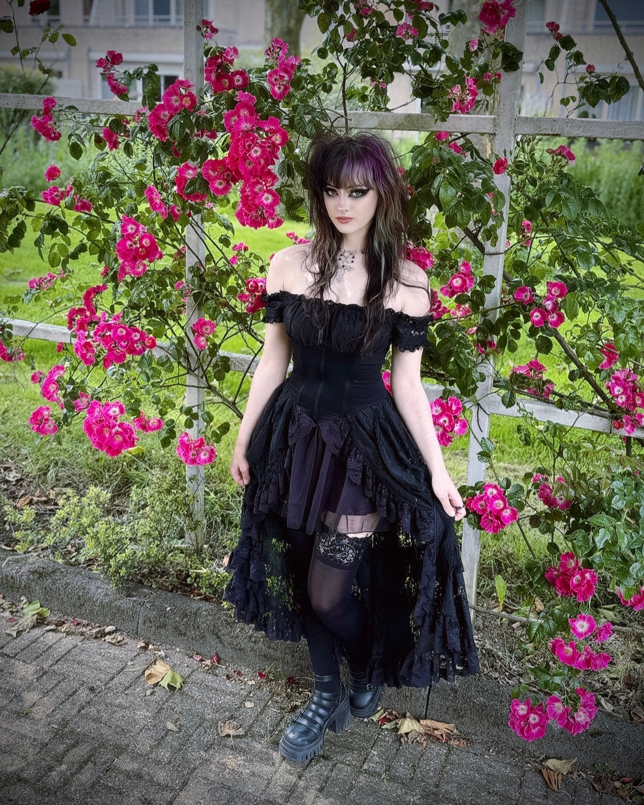 Elegant off shoulder dress by Dark In Love featuring intricate lace-up back design, perfect for sophisticated evening wear.