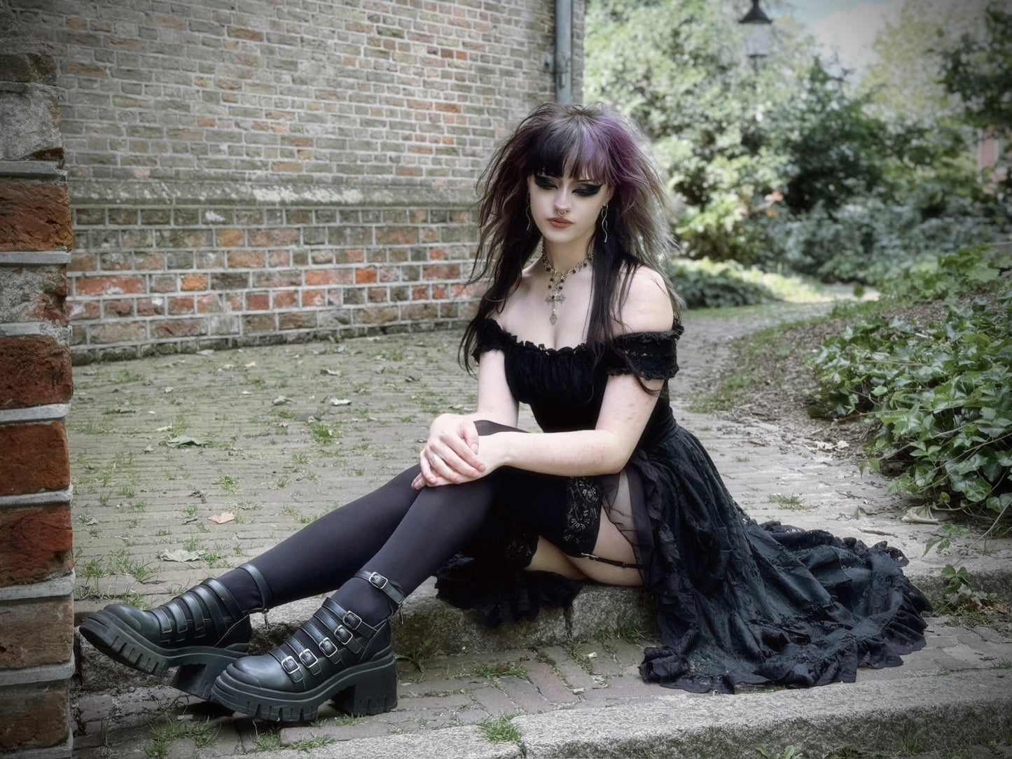 Front view of the enchanting Dark In Love Lilinoe Off Shoulder Dress showcasing its elegant design with decorative lace-up back, perfect for evening wear.