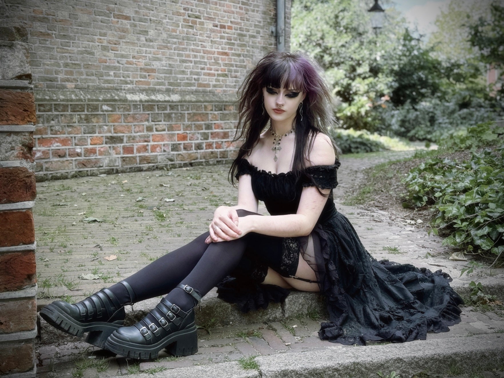 Close-up view of Dark In Love Lilinoe Dress, showcasing luxurious fabric blend and detailed lace-up back, designed for a stunning silhouette.