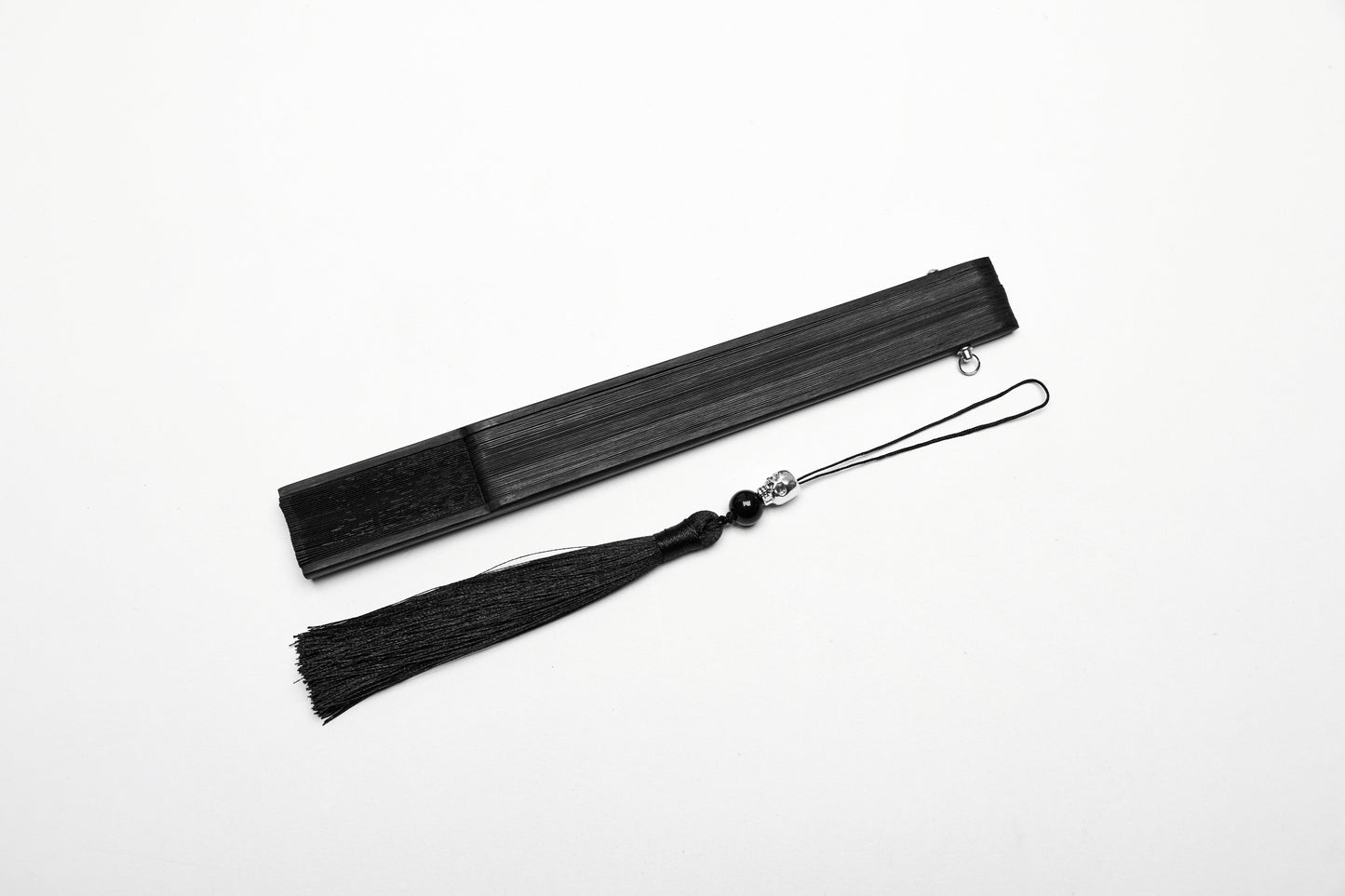 Punk Rave Delaney Hand Fan in a stylish setting, perfect for adding elegance to any outfit, ideal for everyday use.