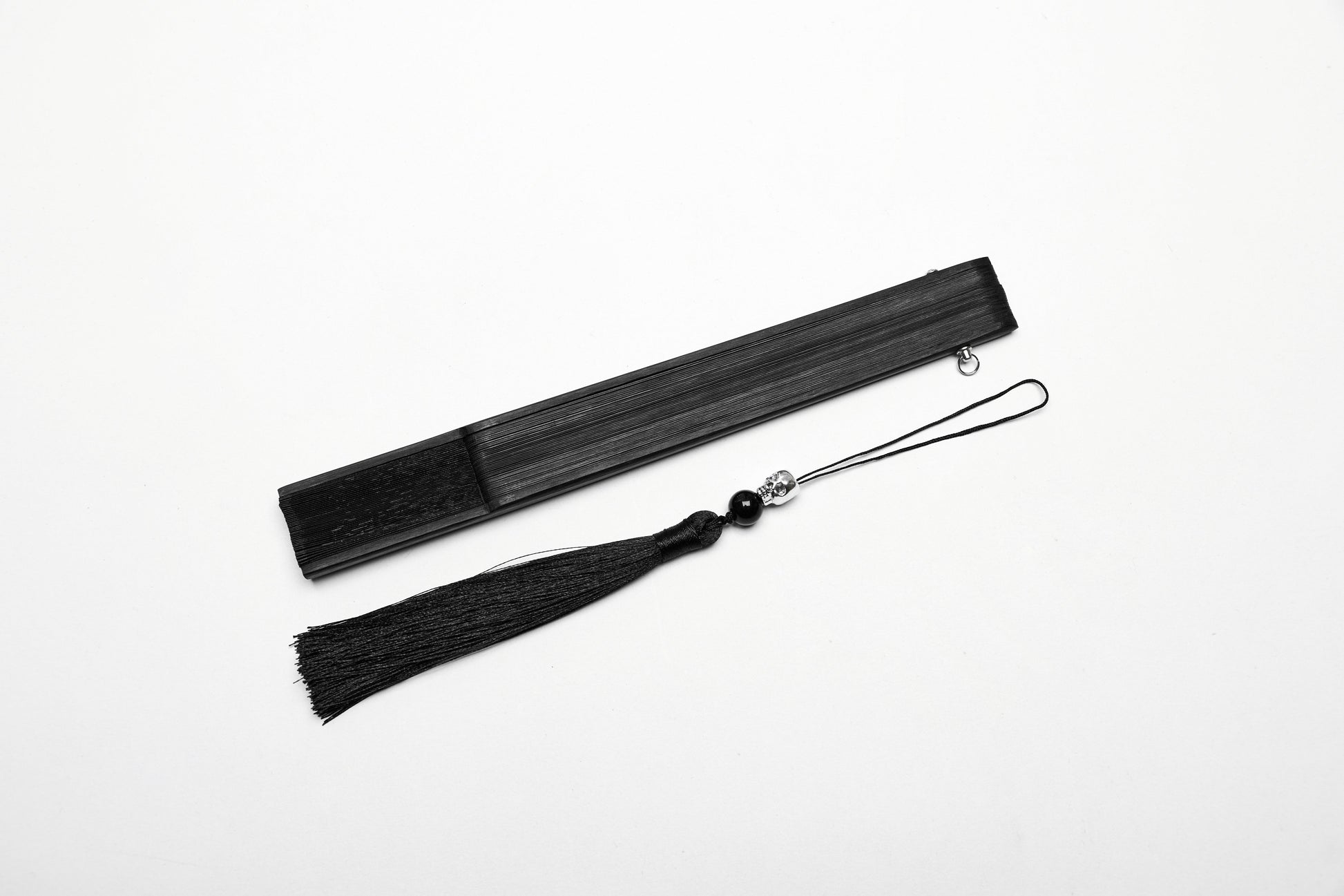 Punk Rave Delaney Hand Fan in a stylish setting, perfect for adding elegance to any outfit, ideal for everyday use.