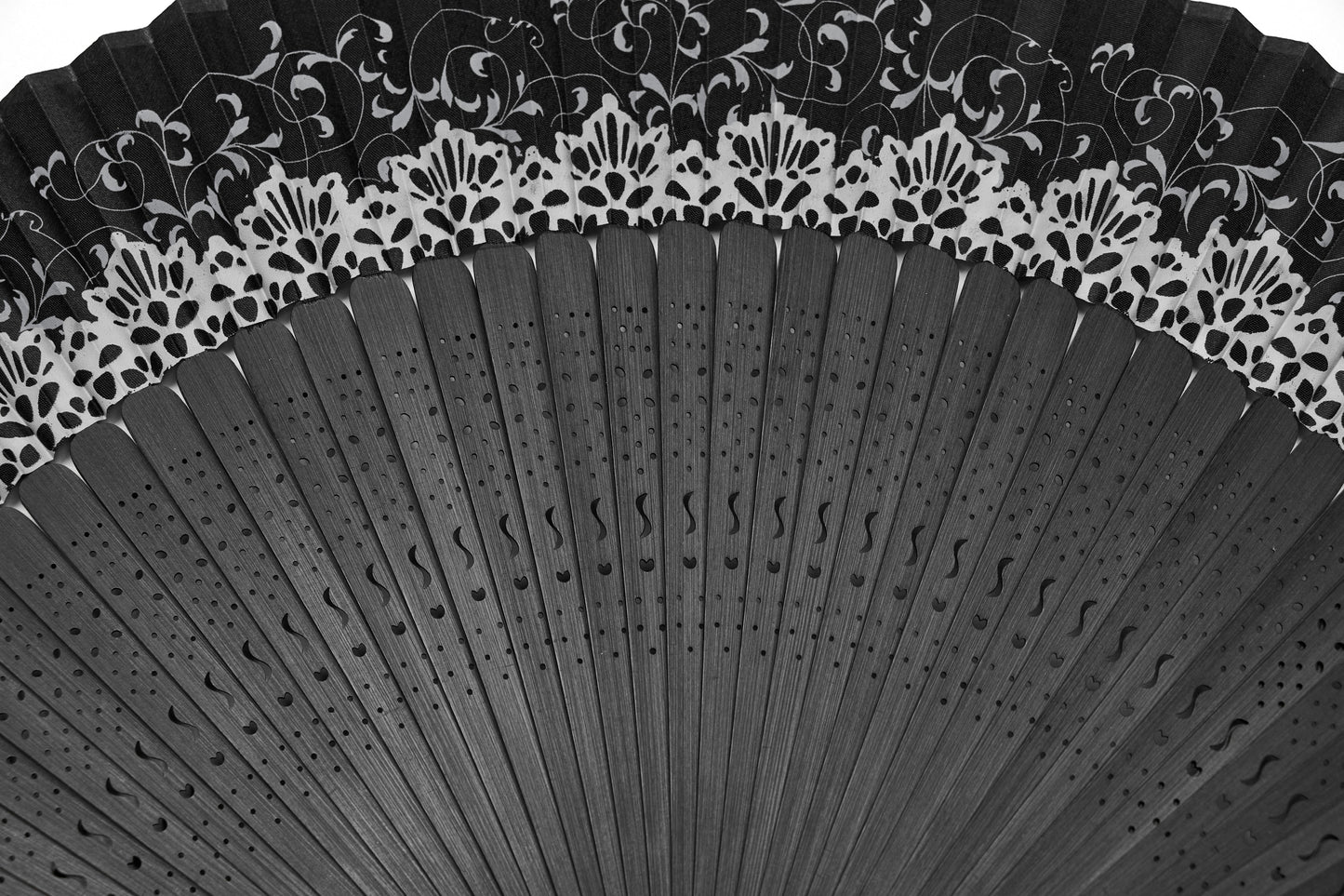 Close-up view of Punk Rave Delaney Elegant Hand Fan showcasing intricate design and skull charm, a luxurious touch for any occasion.