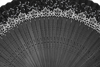 Close-up view of Punk Rave Delaney Elegant Hand Fan showcasing intricate design and skull charm, a luxurious touch for any occasion.