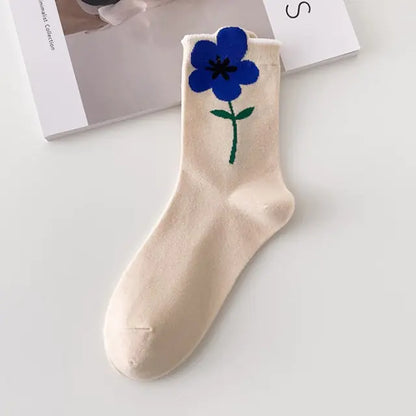 Sophisticated cream socks featuring a blue flower pattern, adding a touch of elegance to the luxurious Women's Tie-Dye Middle Tube Socks.