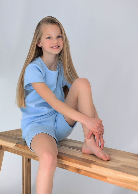 DreamBuy unisex kids Ice Blue cotton shorts and T-shirt set displayed elegantly, showcasing soft and comfortable summer wear.