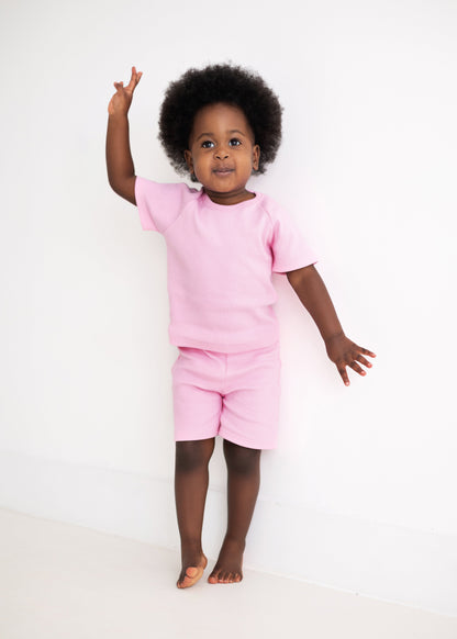 Adorable kids summer wear by DreamBuy, consisting of a cute pink ballerina shorts and t-shirt set for boys and girls.