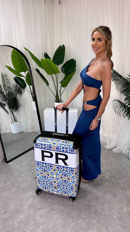 Luxury Ariel Cut Out Maxi Dress featuring a stylish one-shoulder design, perfect for celebrations. Available in sizes S to L, showcasing a flattering fitted silhouette and playful cheeky cut-out detail.