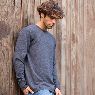 Elegant crew neck sweatshirt crafted from sustainable materials, showcasing a trendy French terry design and angled rib detailing.