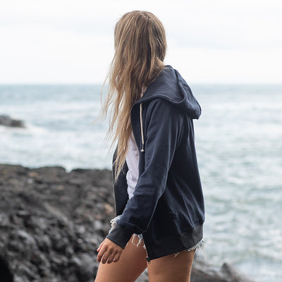 Artistic view of the Contrast Zipped Recycled Hoodie, revealing the luxurious texture and stylish contrast details in a sustainable fashion statement.