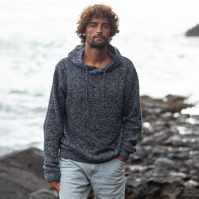 Elegant detail of the Iguazu Hoodie hood with stylish drawcords, perfect for cozy outdoor adventures.