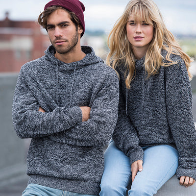Luxurious Iguazu Recycled Knitted Hoodie crafted from 70% regenerated cotton, featuring a chunky tuck stitch and stylish ribbed cuffs, perfect for sustainable fashion enthusiasts seeking comfort and elegance in sizes XS to 2XL.