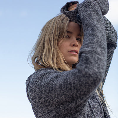 Sophisticated ribbed cuffs and hem of the Iguazu Hoodie, combining comfort with eco-friendly materials.