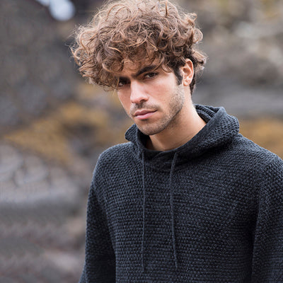 Sustainable fashion at its finest: Iguazu hoodie with drawcord hood, perfect for outdoor adventures and eco-conscious living.