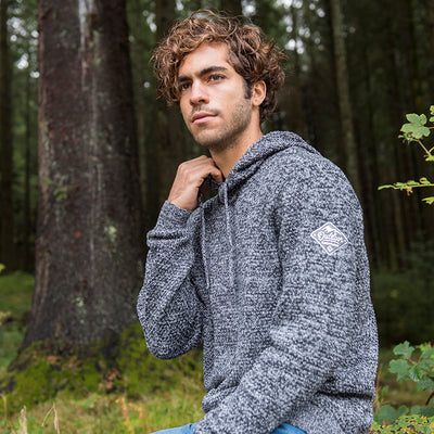 Detailed view of Iguazu hoodie showcasing the intricate chunky tuck stitch, symbolising luxury and sustainability in one.