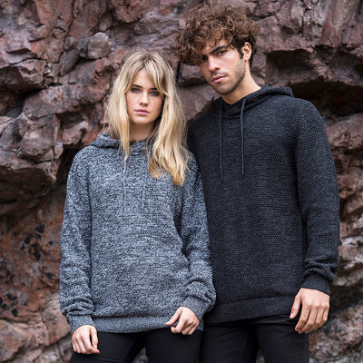 Luxurious close-up of Iguazu Hoodie fabric highlighting the premium chunky tuck stitch and recycled materials, ideal for environmentally conscious fashion.