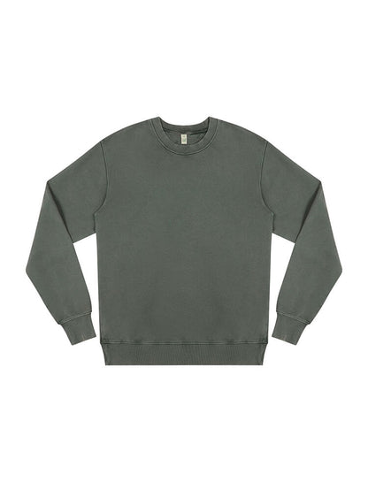 Model wearing the classic organic cotton faded sweatshirt, exemplifying the relaxed fit and tailored cut for a luxurious everyday style.