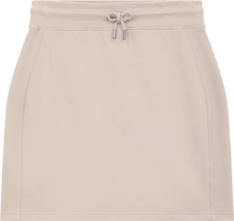 Stylish women’s organic cotton sweat skirt worn in a chic casual outfit, emphasising its versatility and timeless appeal in contemporary fashion.